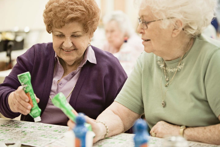 Smiling women playing bingo